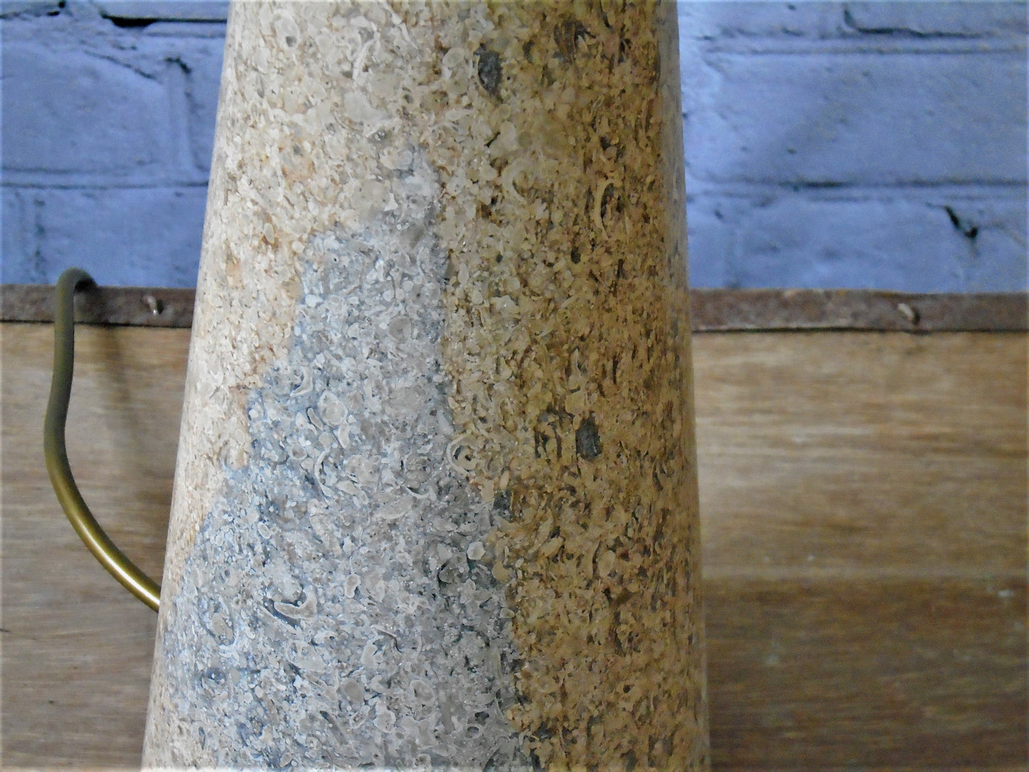 A Conical Polished Limestone Lamp Base