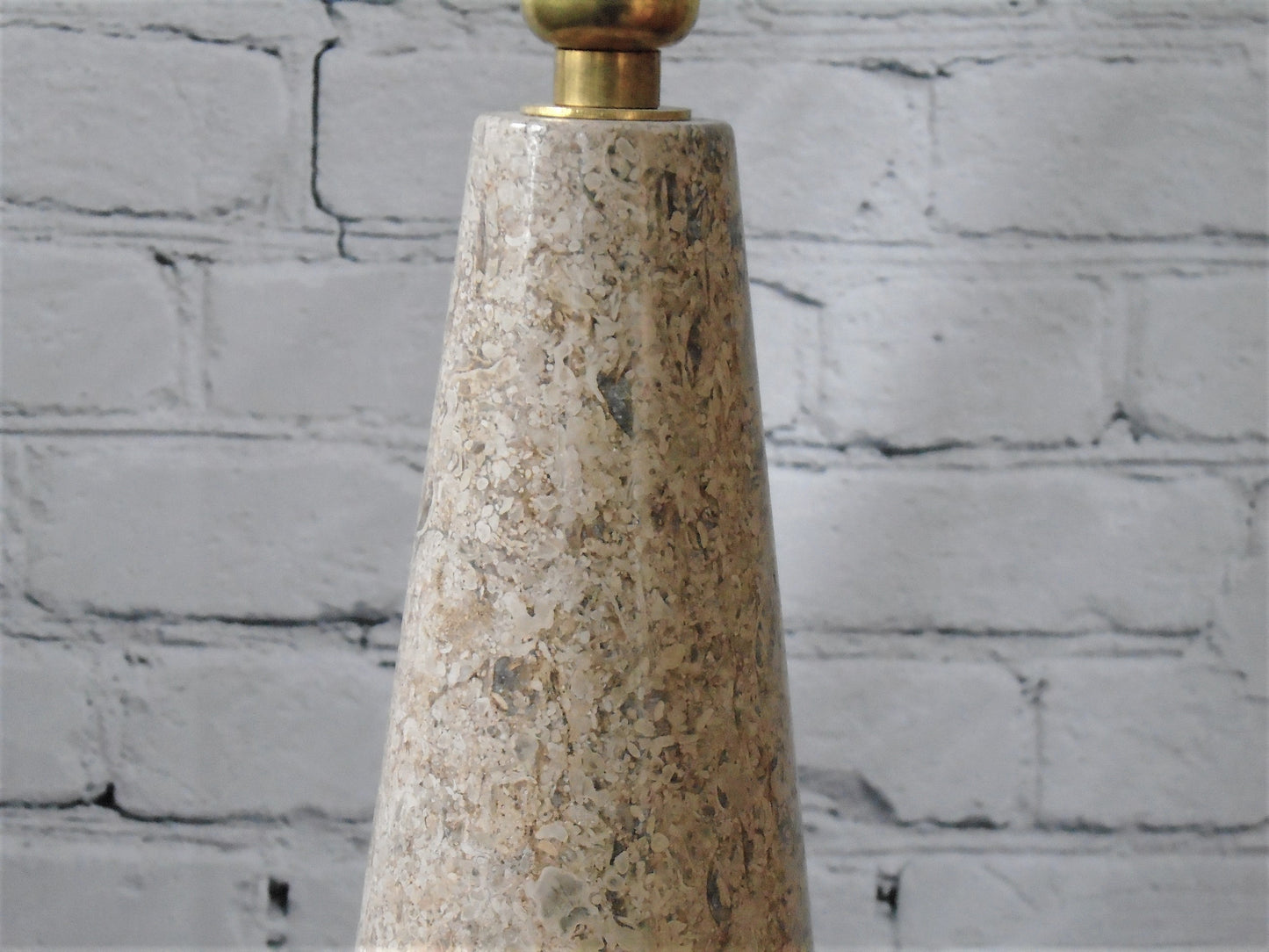 A Conical Polished Limestone Lamp Base