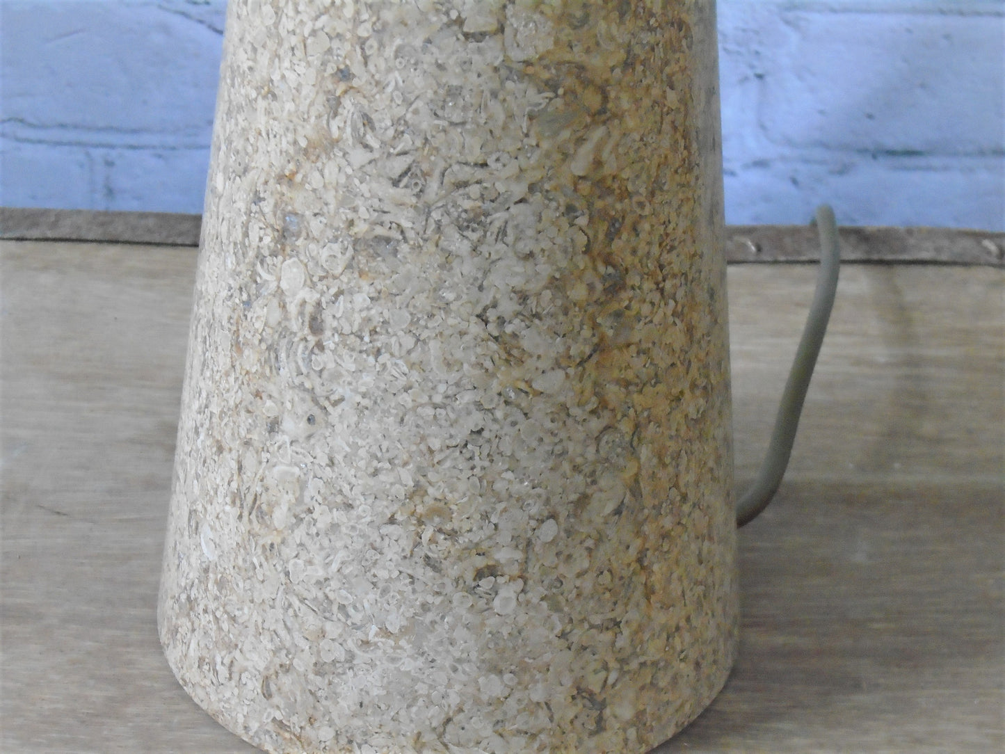 A Conical Polished Limestone Lamp Base