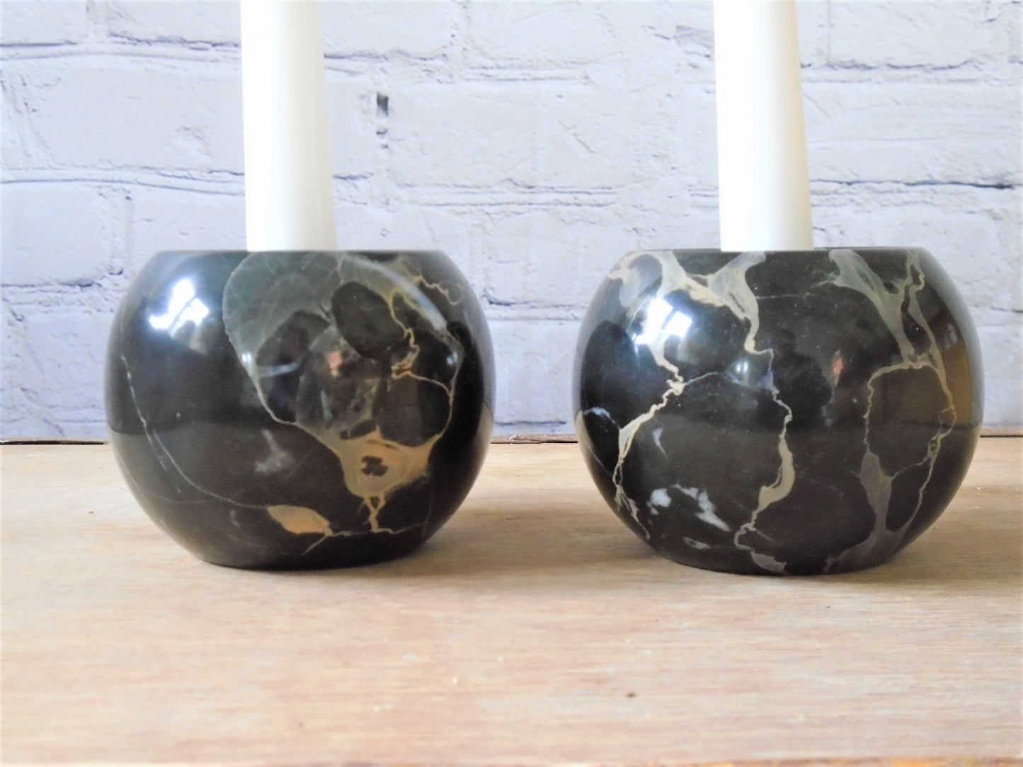 A Pair of Portoro Marble Candle Holders