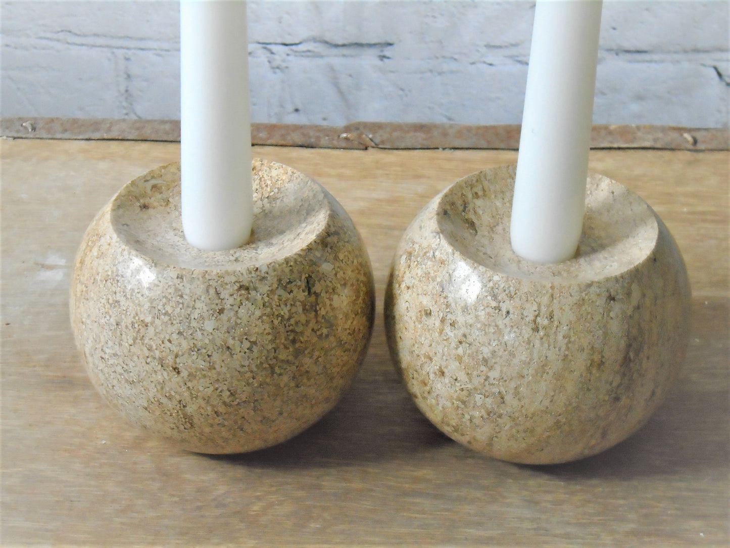 A pair of Ancaster Weatherbed Candle Holders