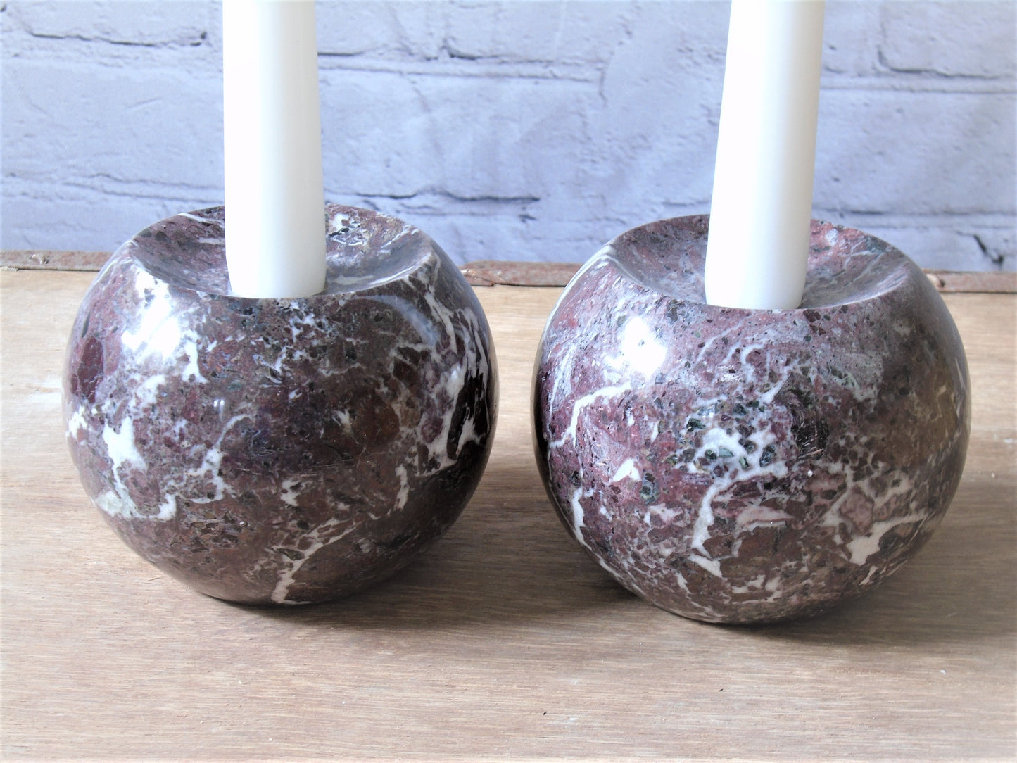 A Pair of Rosso Levanto Marble Candle Holders