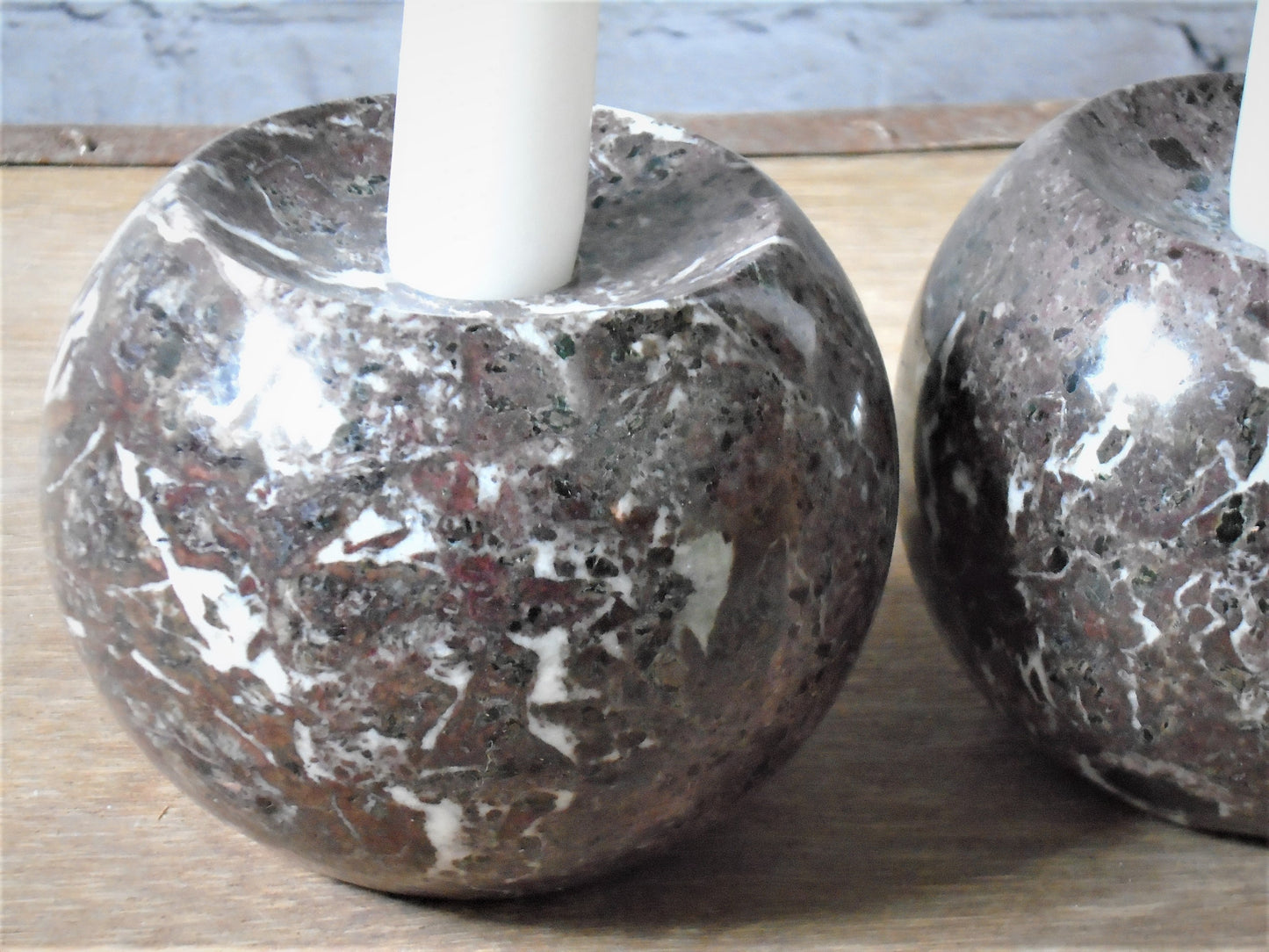A Pair of Rosso Levanto Marble Candle Holders