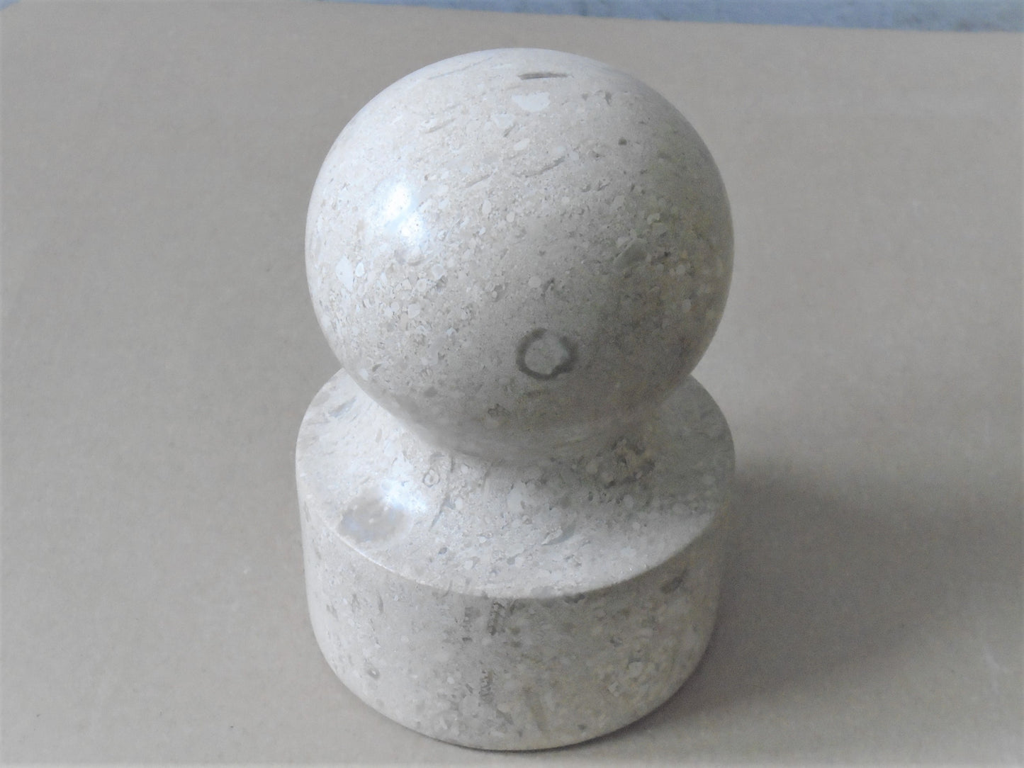 A Mirabelle Limestone Door Stop