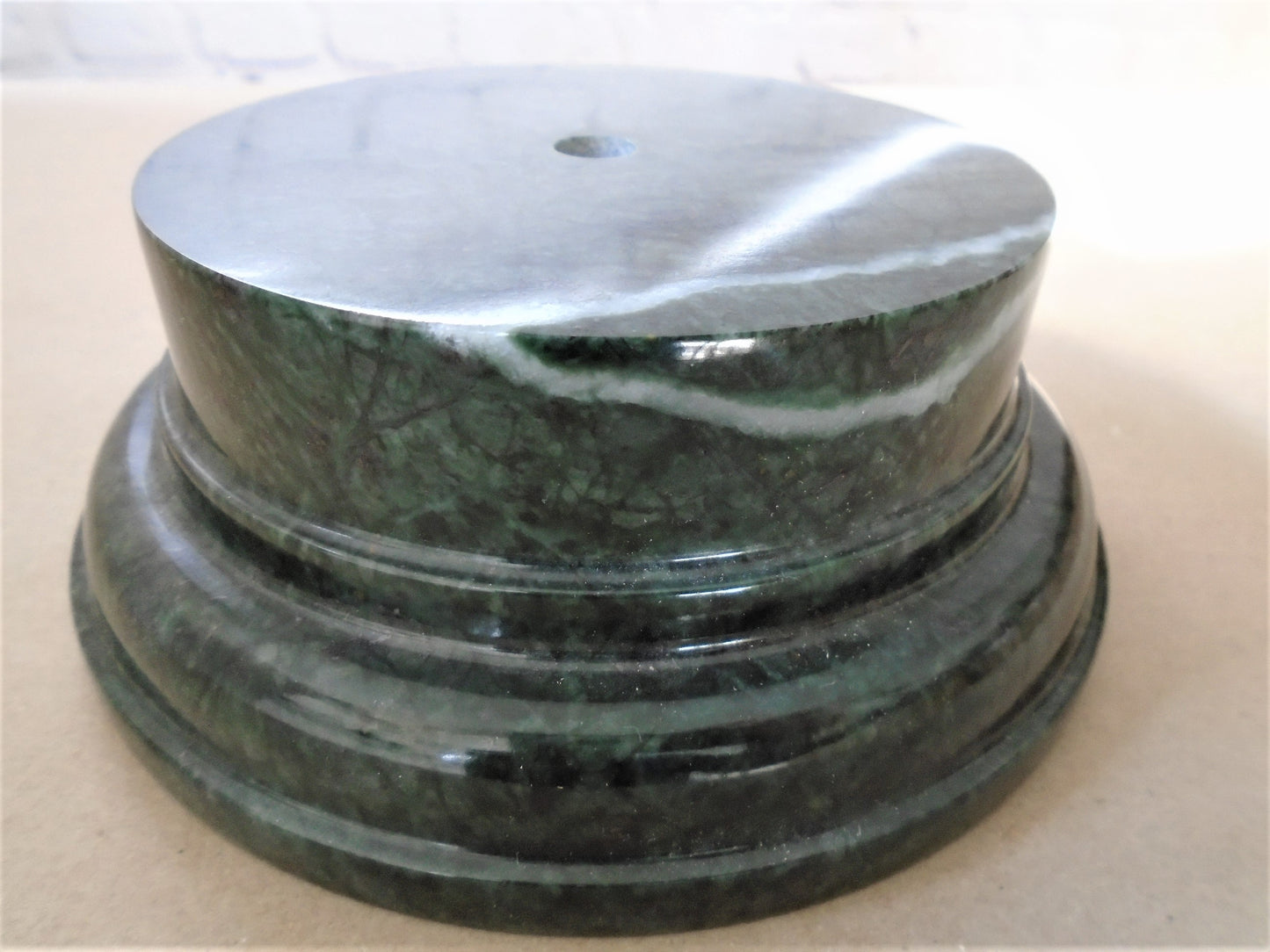 An Indian green Marble Socle