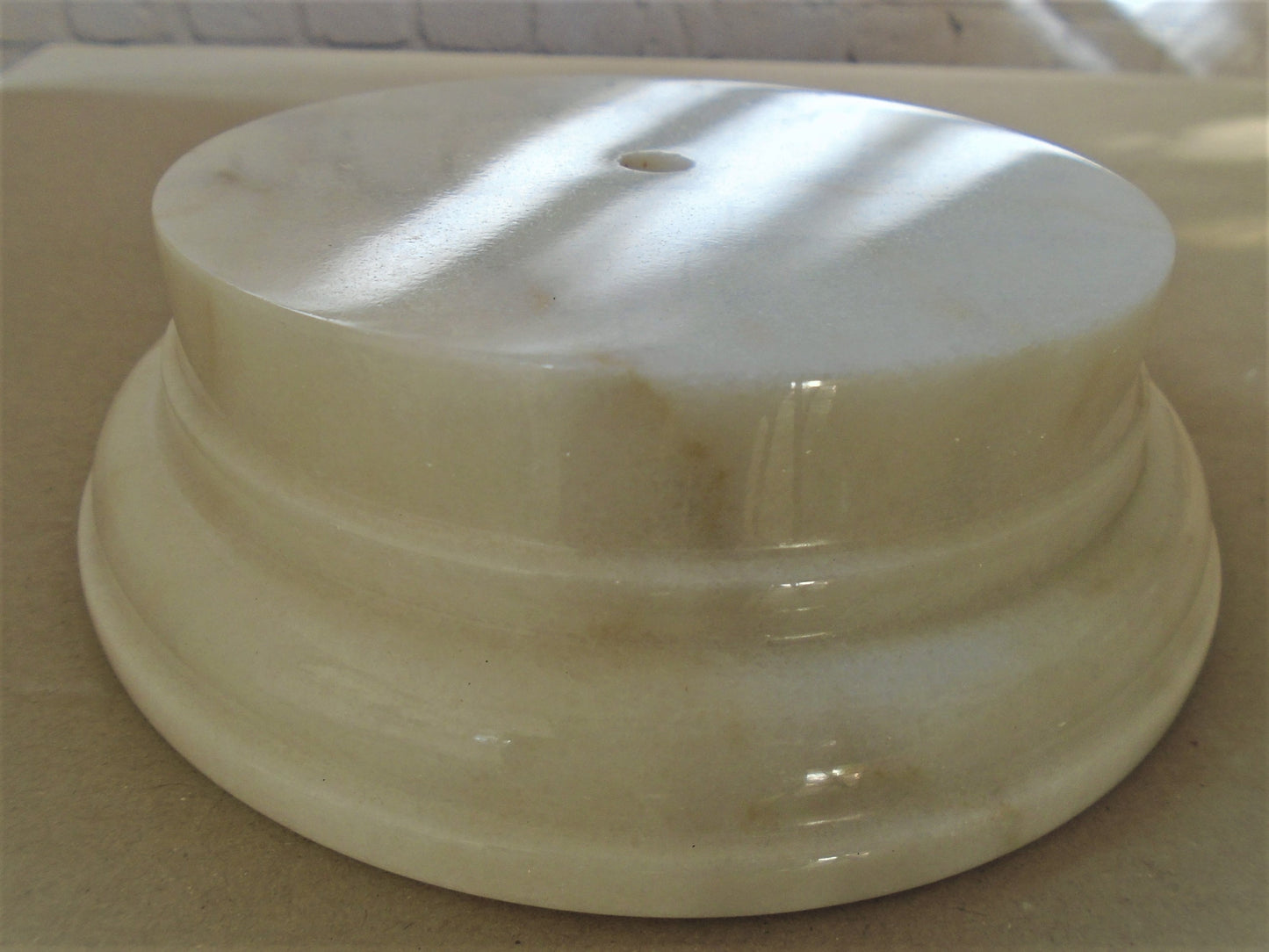 A Rosa Claro Marble Socle