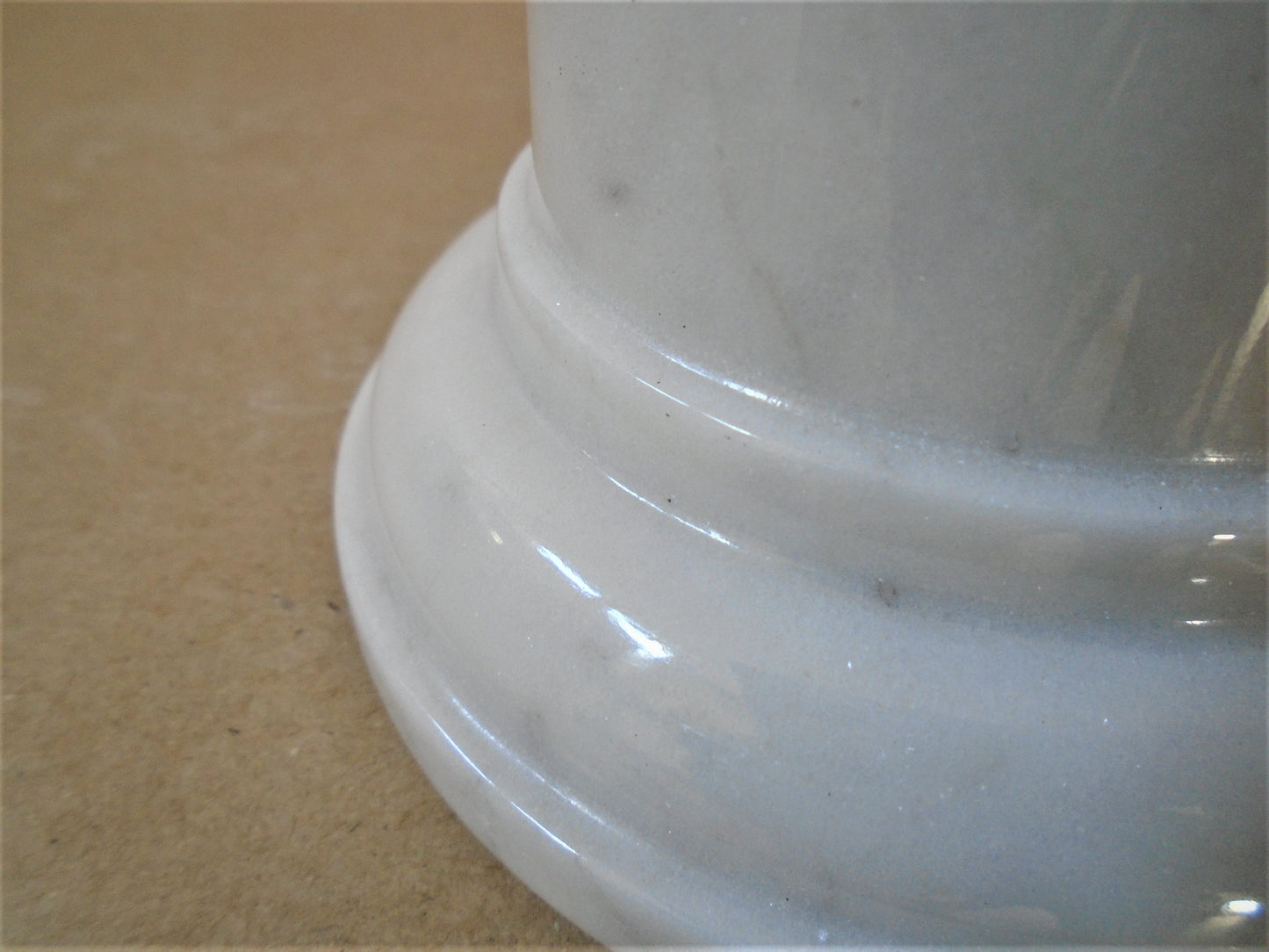 A Carrara White Marble Socle