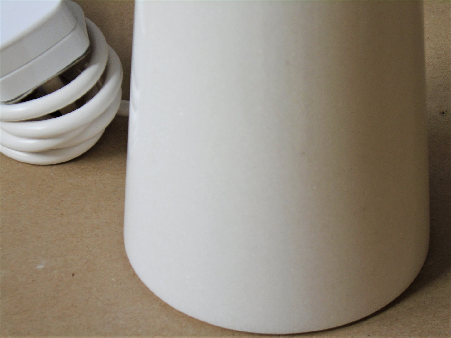 A Conical White Marble Lamp Base