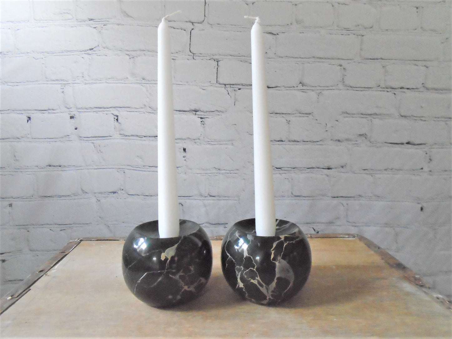 A Pair of Portoro Marble Candle Holders
