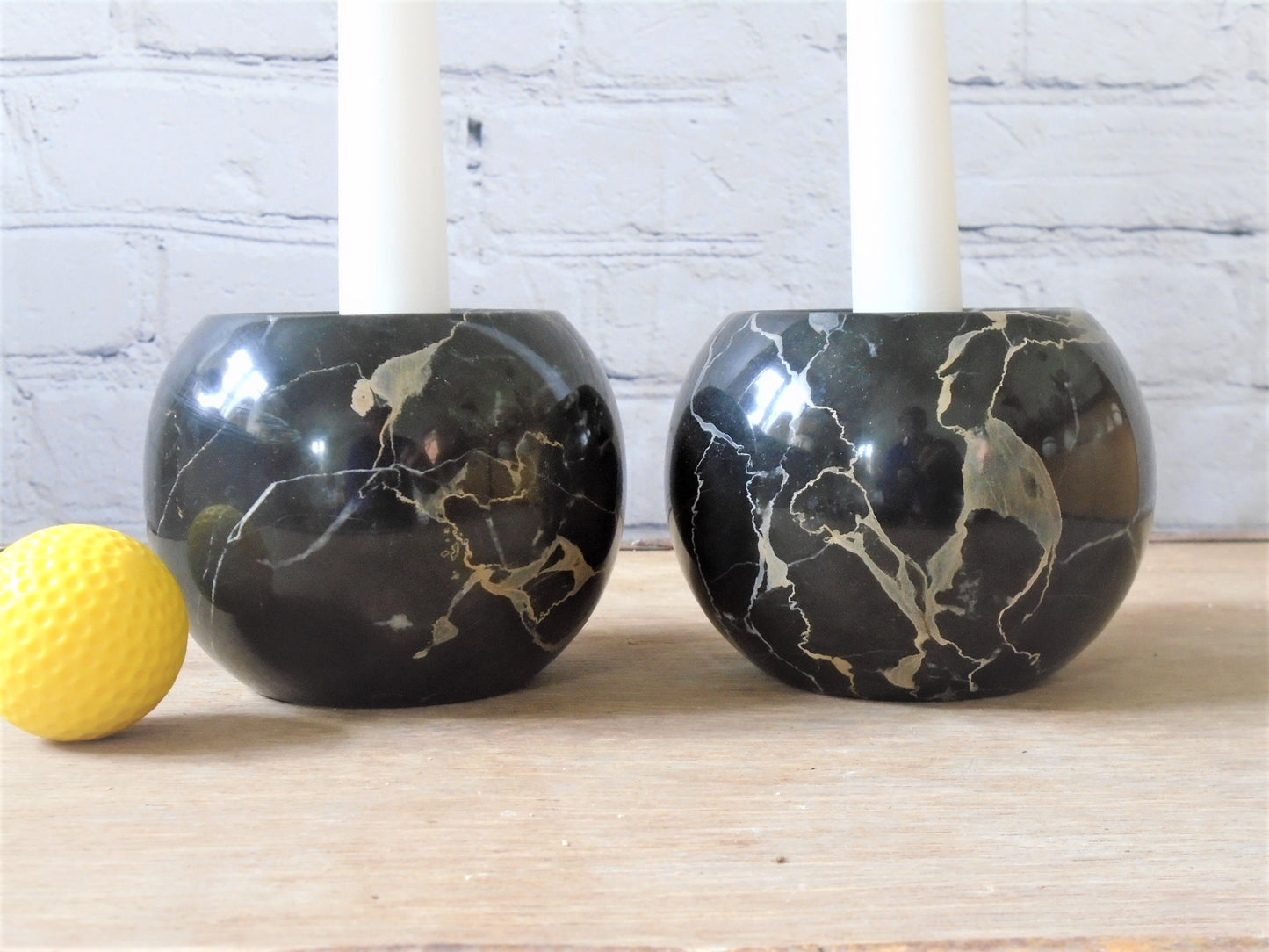 A Pair of Portoro Marble Candle Holders