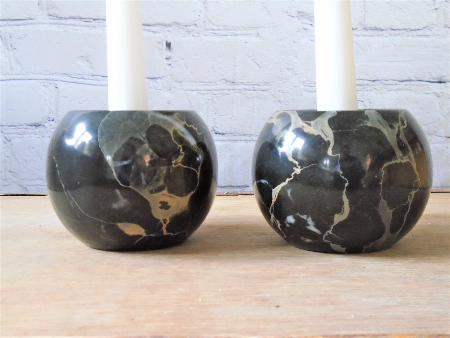A pair of Portoro Marble Candle Holders