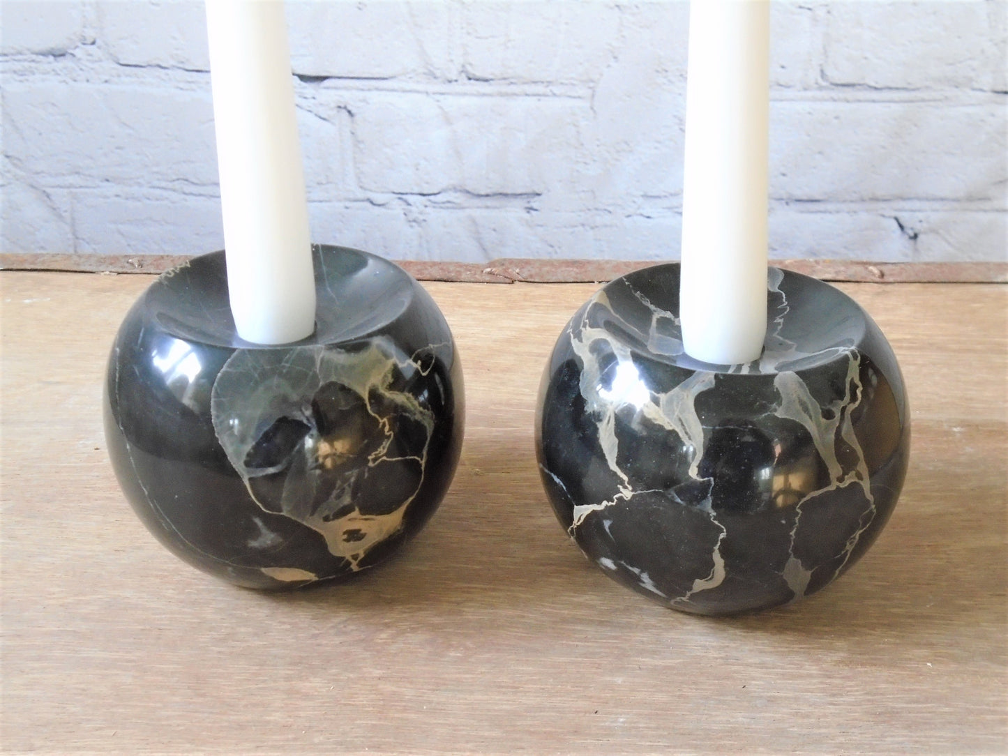 A Pair of Portoro Marble Candle Holders