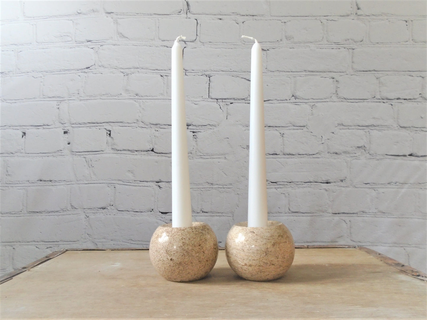 A pair of Ancaster Weatherbed Candle Holders
