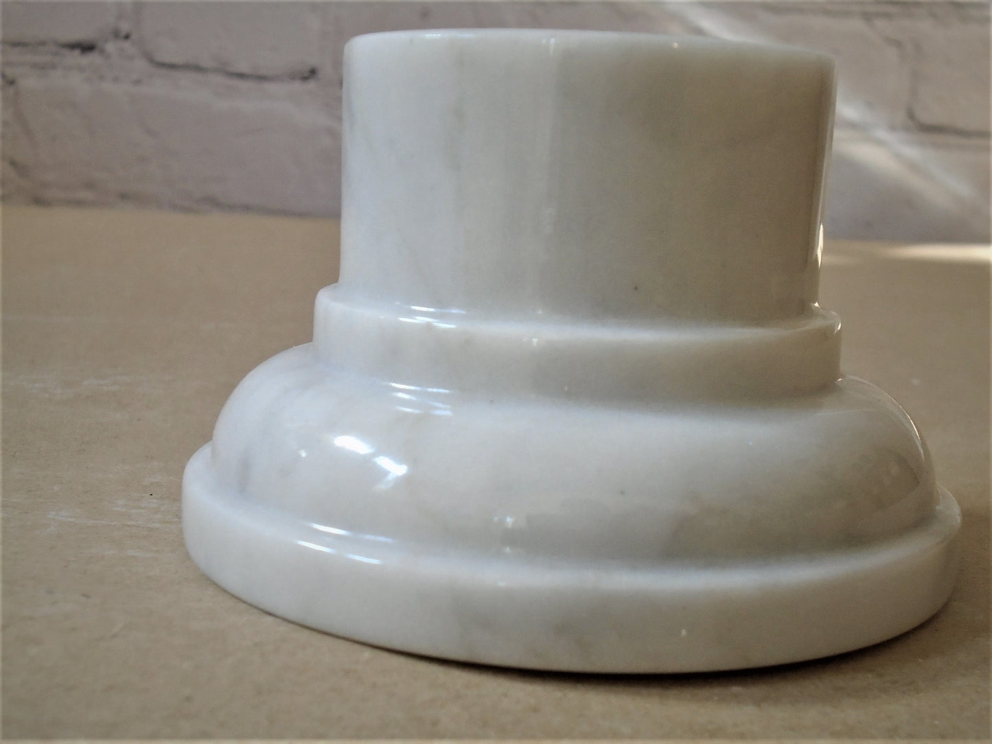 A Carrara White Marble Socle