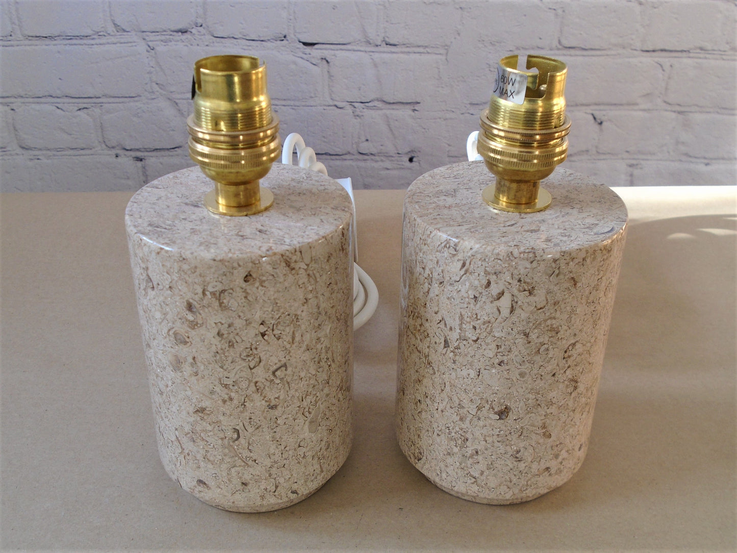 A Pair of Cylinder Lamps in Ancaster Weatherbed Limestone