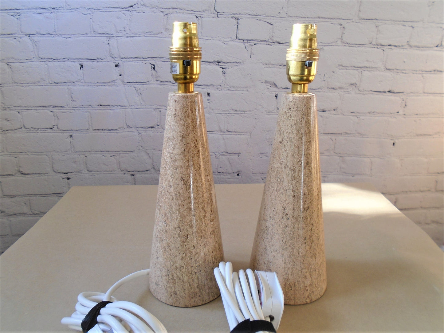 A Pair of Ancaster Weatherbed Lamp Bases